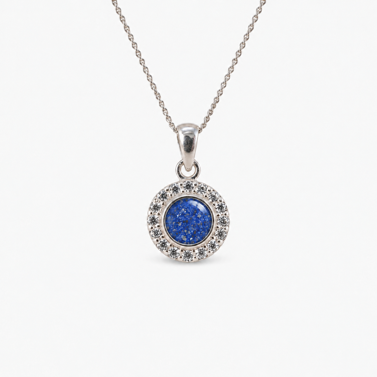 Dainty Halo Ashes Necklace in Sapphire with visible inclusions