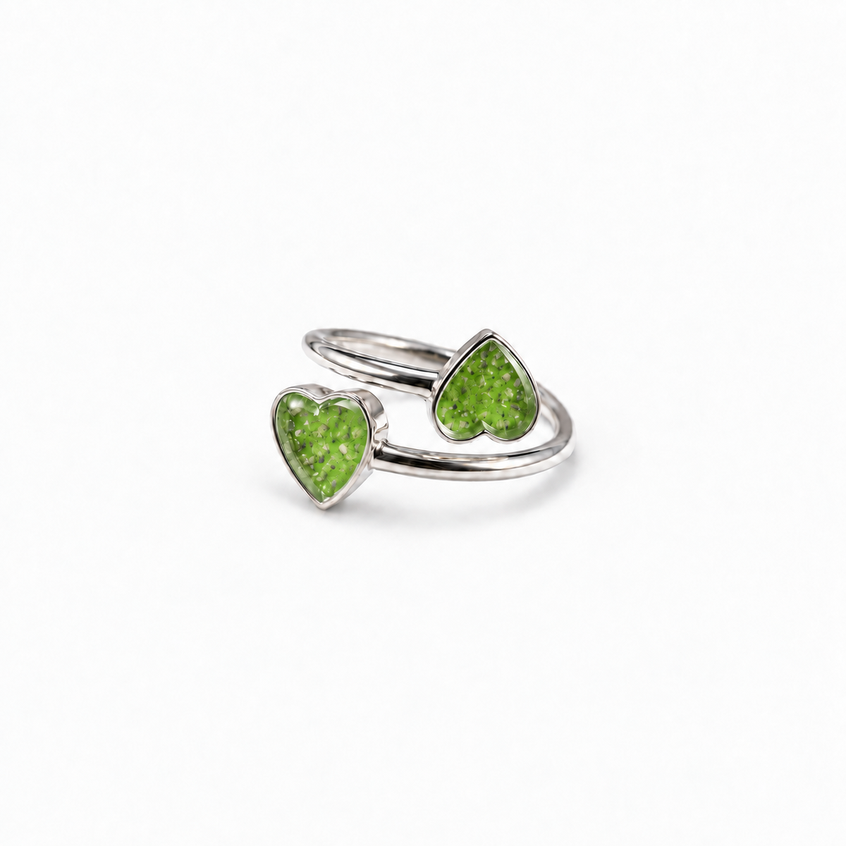 Double Heart Ashes Ring in Apple Green with visible ashes