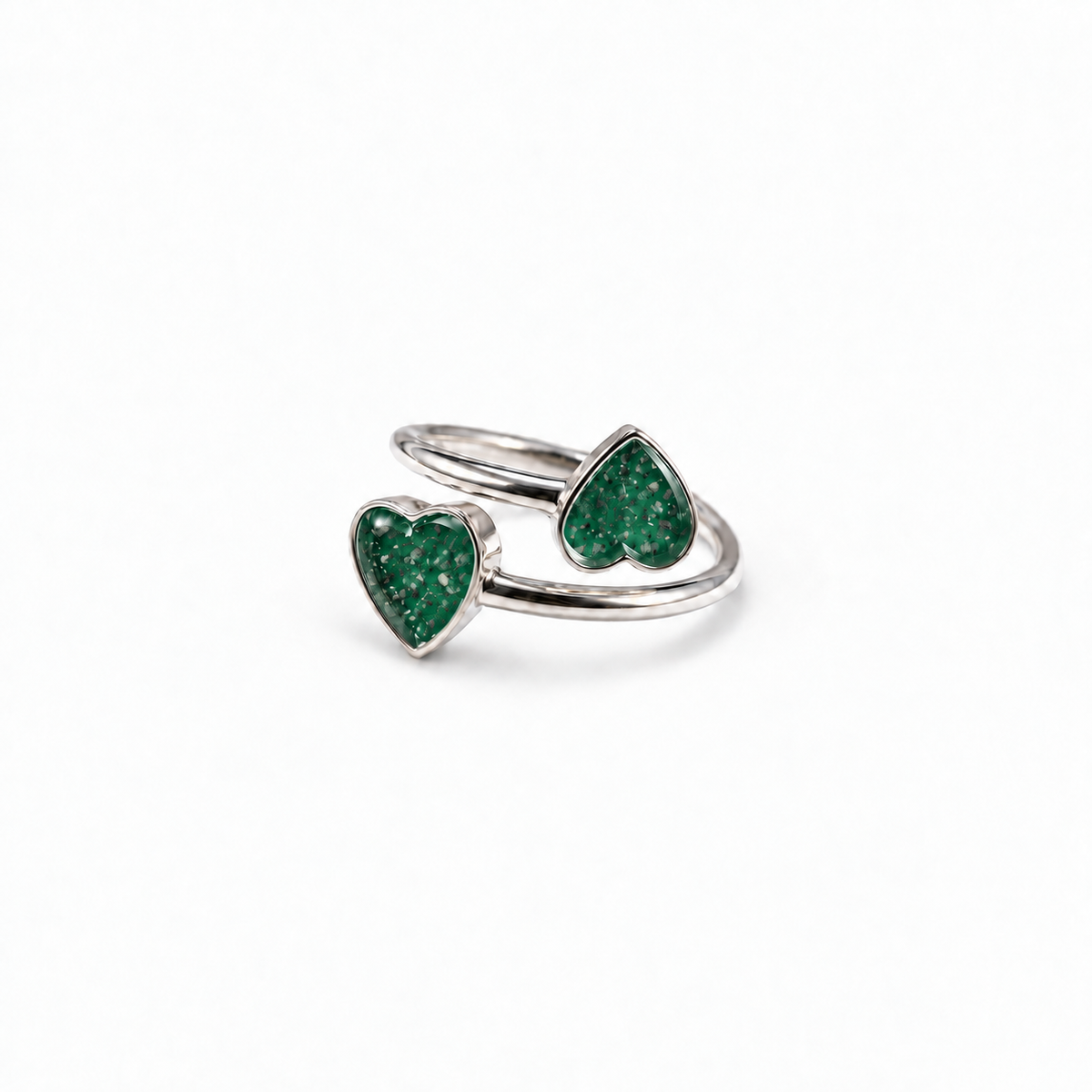 Double Heart Ashes Ring in Emerald with visible ashes