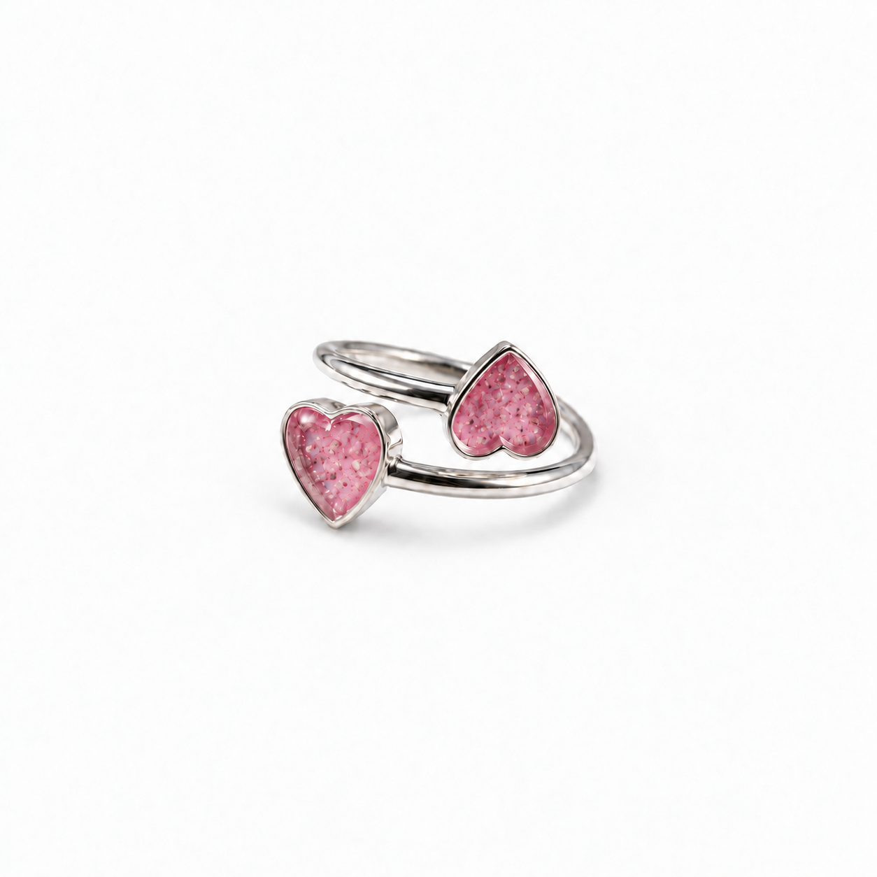 Double Heart Ashes Ring in Pink with visible ashes