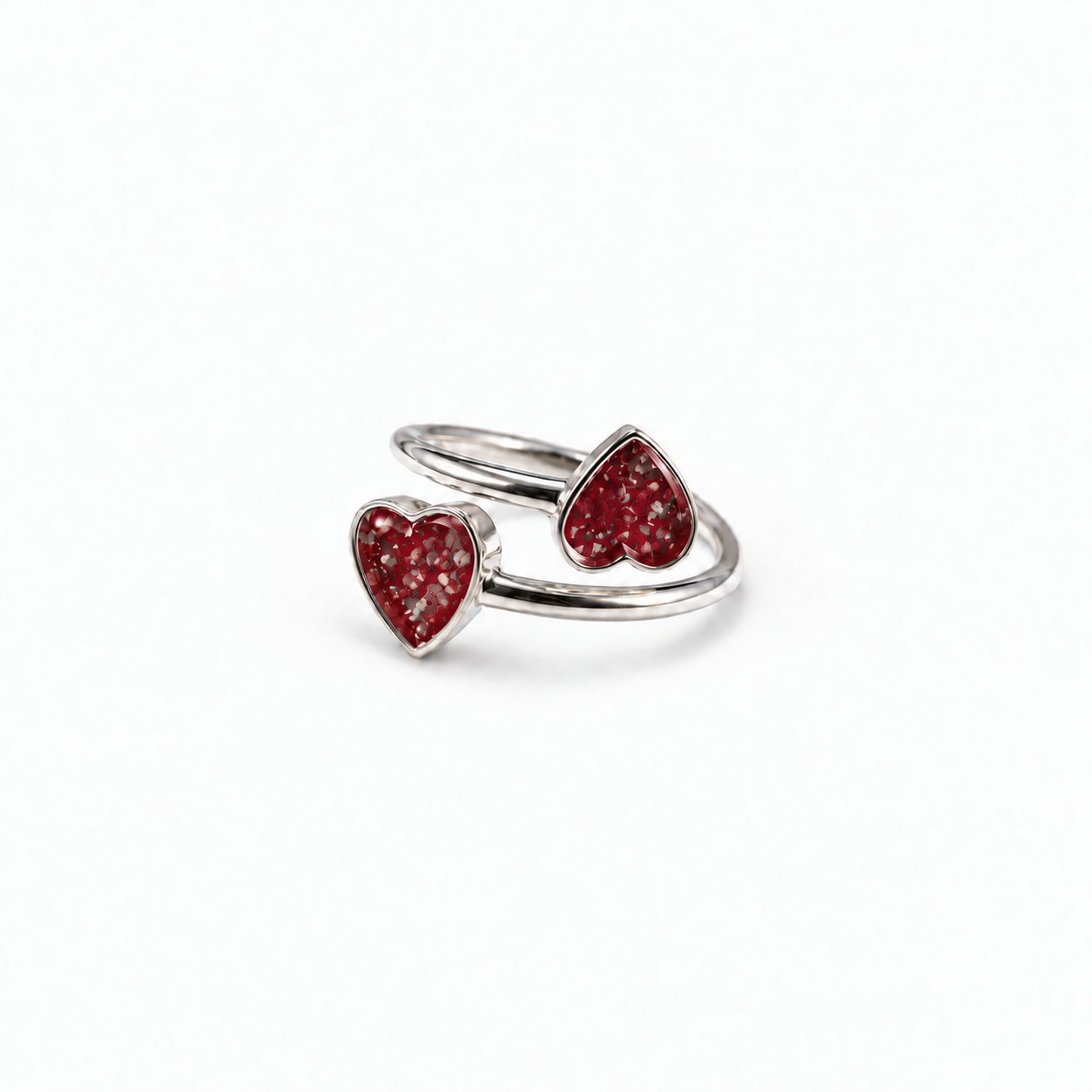 Double Heart Ashes Ring in Ruby Red with visible ashes