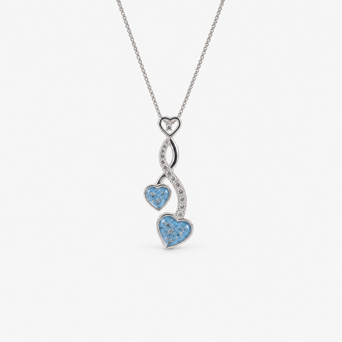 Entwined Hearts Ashes Necklace — Sky Blue, visible ashes