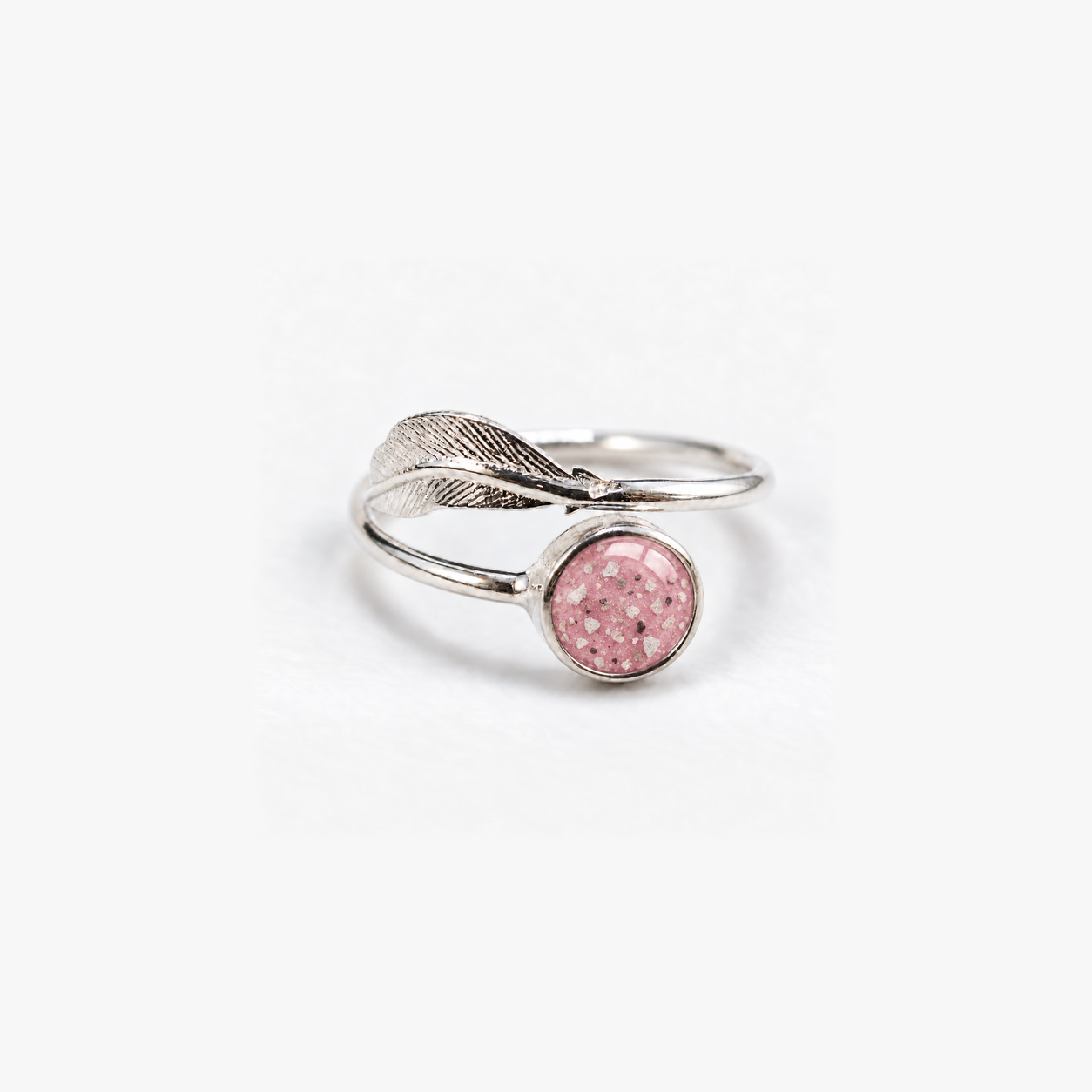 Feather Ashes Ring in Pink with visible ashes