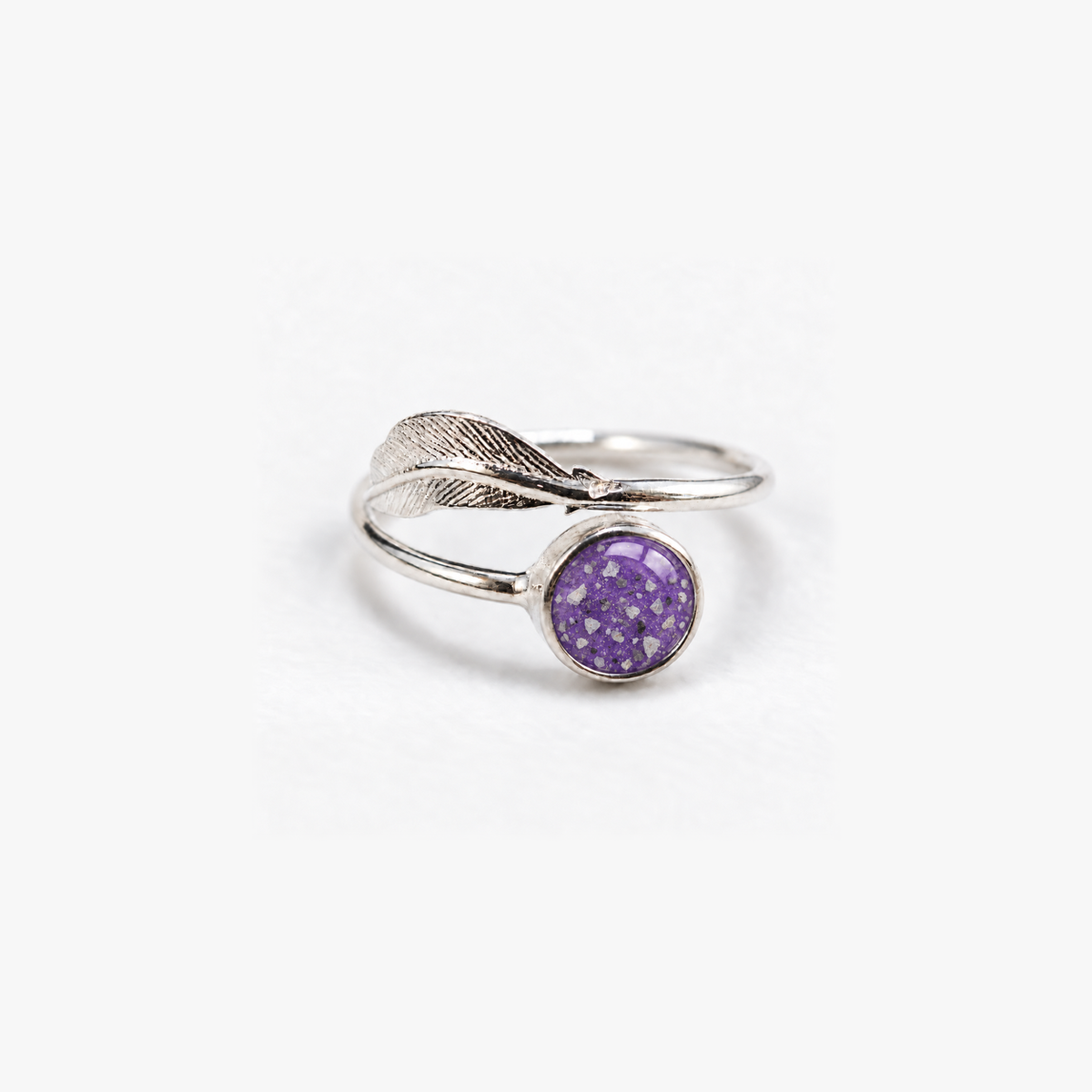 Feather Ashes Ring in Purple with visible ashes