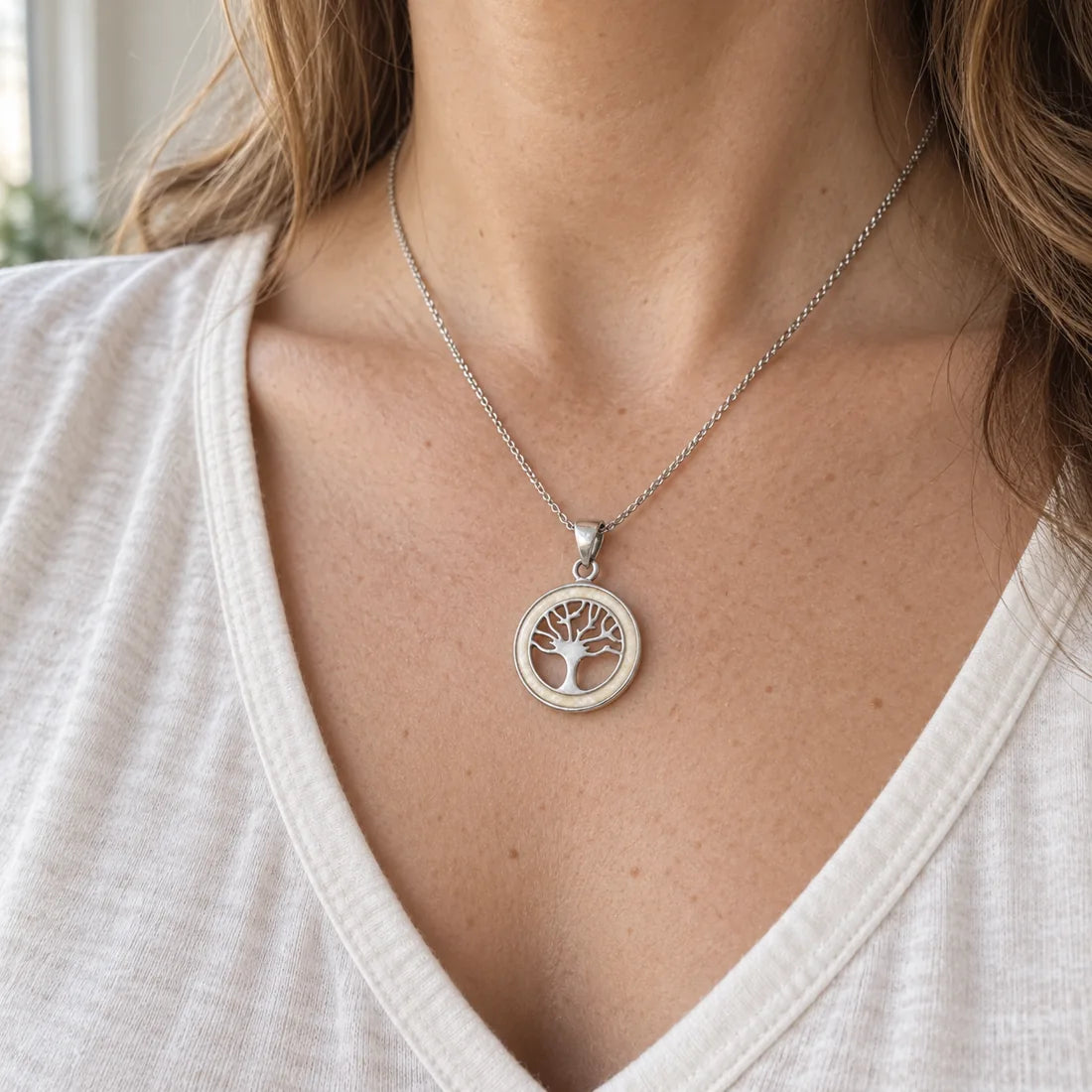 Tree of Life breast milk necklace worn on an 18 inch chain, illustrative lifestyle preview