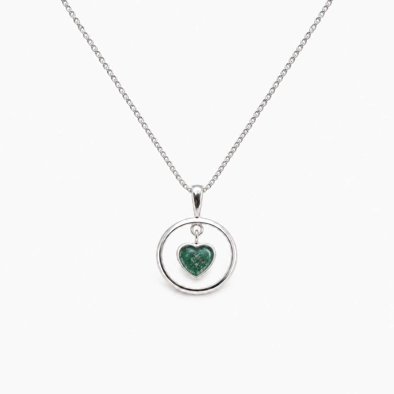 Floating Heart Ashes Necklace — Emerald, visible ashes