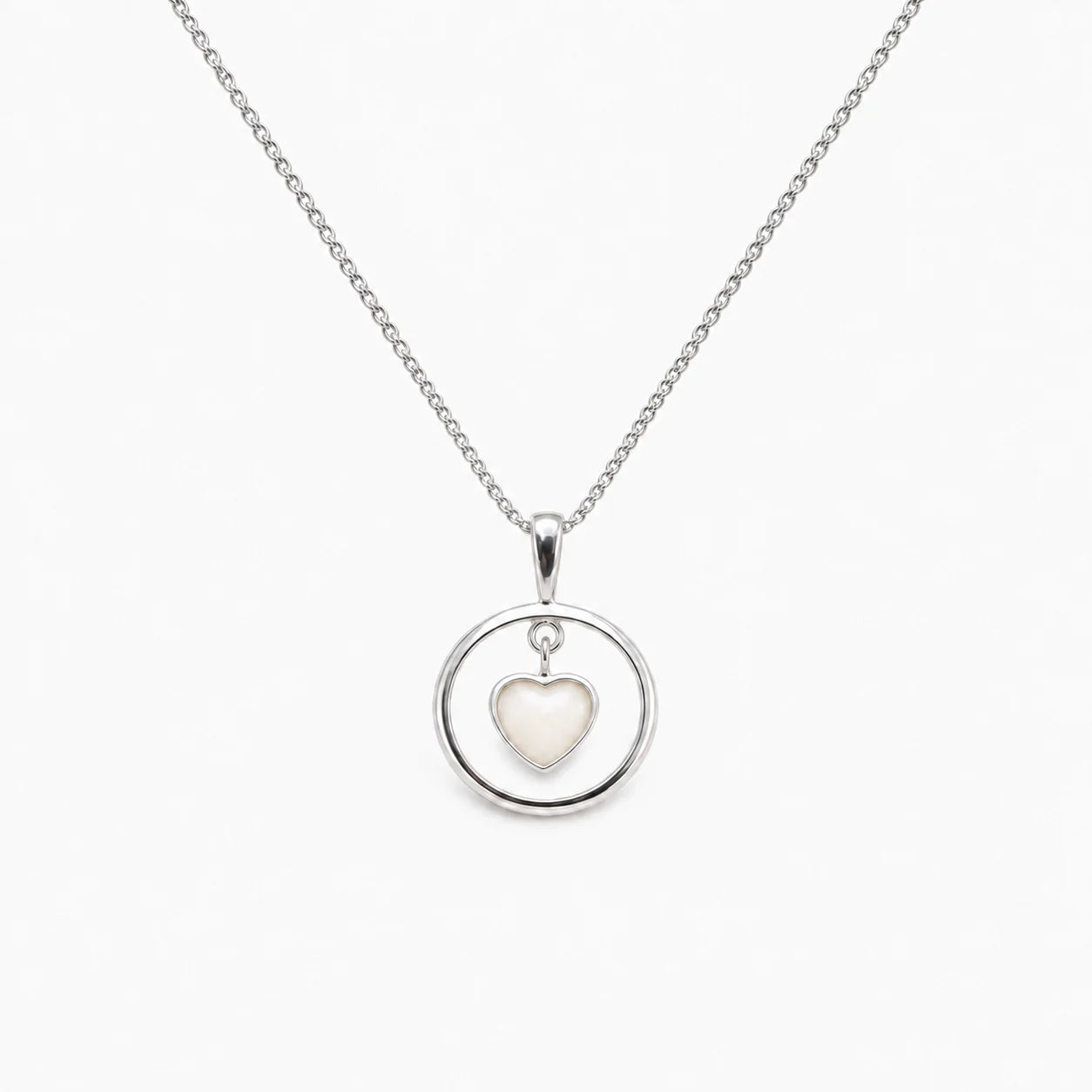 Floating Heart Breast Milk Necklace in sterling silver with natural milk resin — illustrative preview