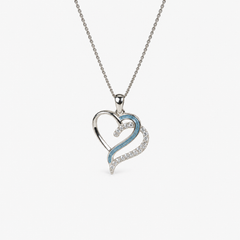 Flowing Hearts Ashes Necklace — Sky Blue, visible ashes