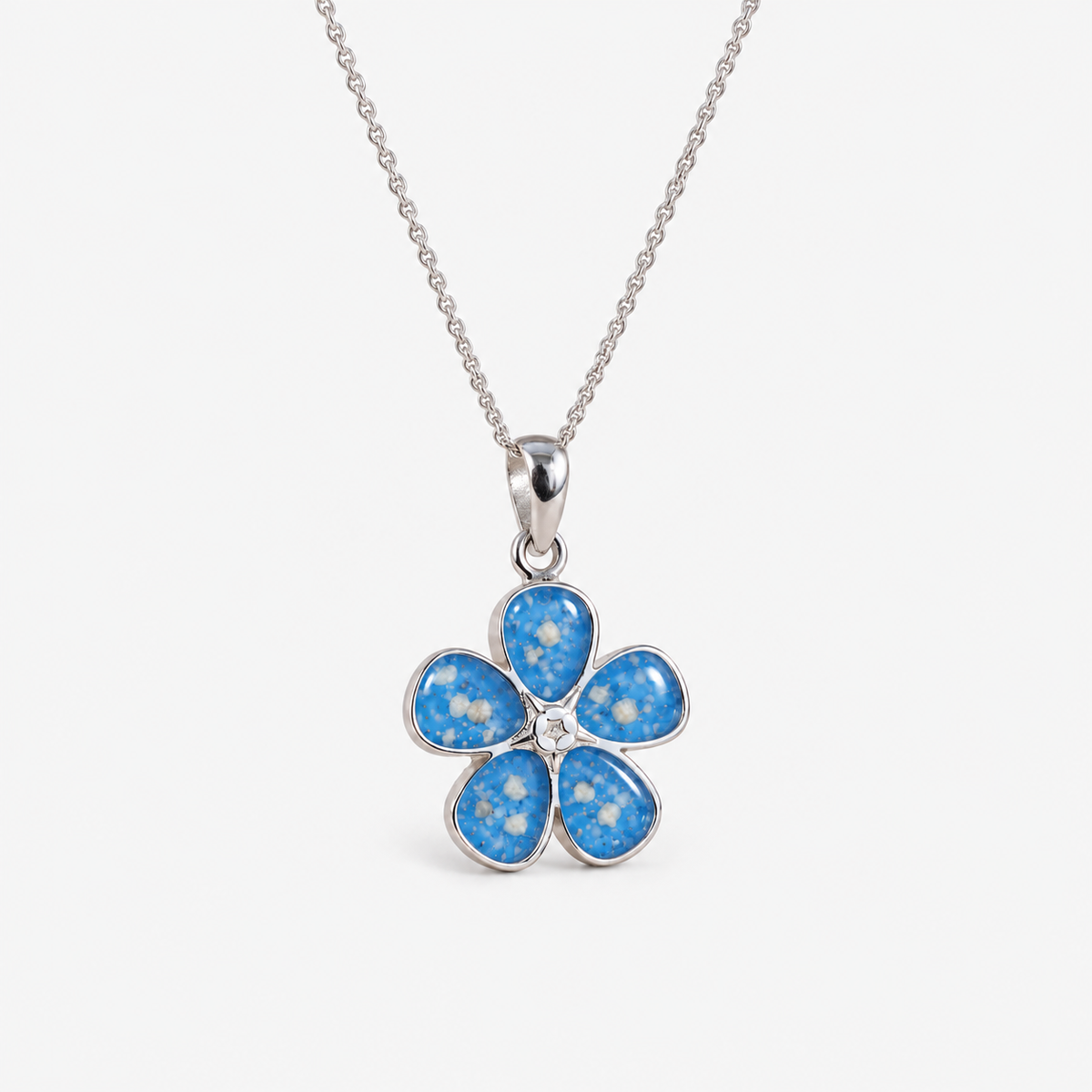 Forget-Me-Not Ashes Necklace in Sky Blue with visible ashes