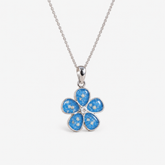 Forget-Me-Not Ashes Necklace in Sky Blue with visible ashes