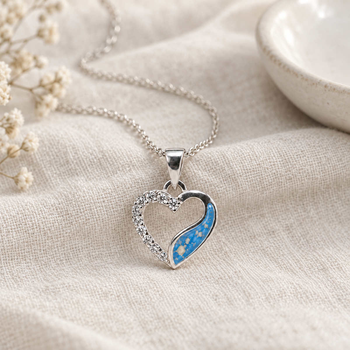 Crystal Sweep Heart Ashes Necklace – Sky Blue visible ashes – lifestyle