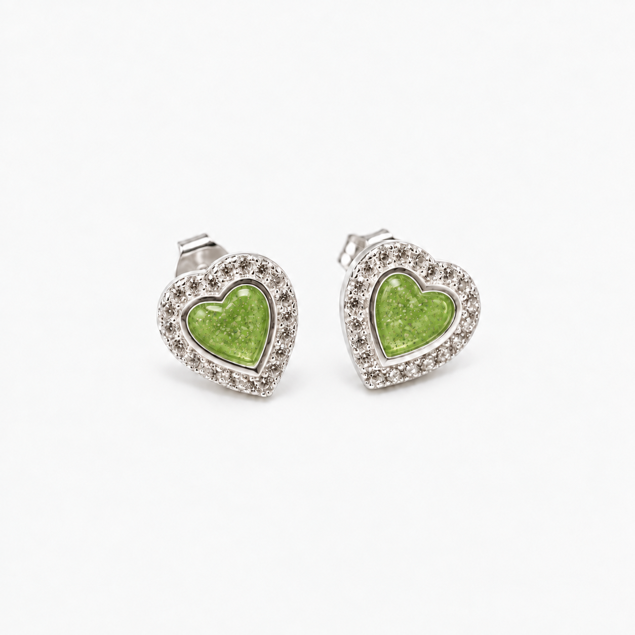 Heart Halo Ashes Earrings — Apple Green, visible ashes