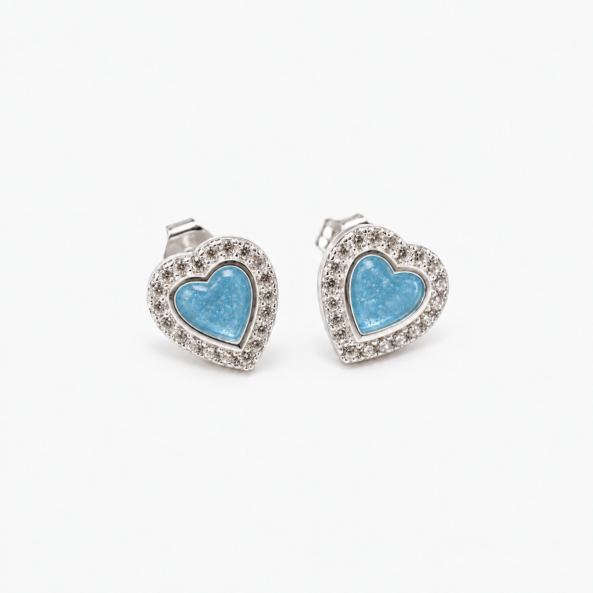 Heart Halo Ashes Earrings in Sky Blue with visible inclusions