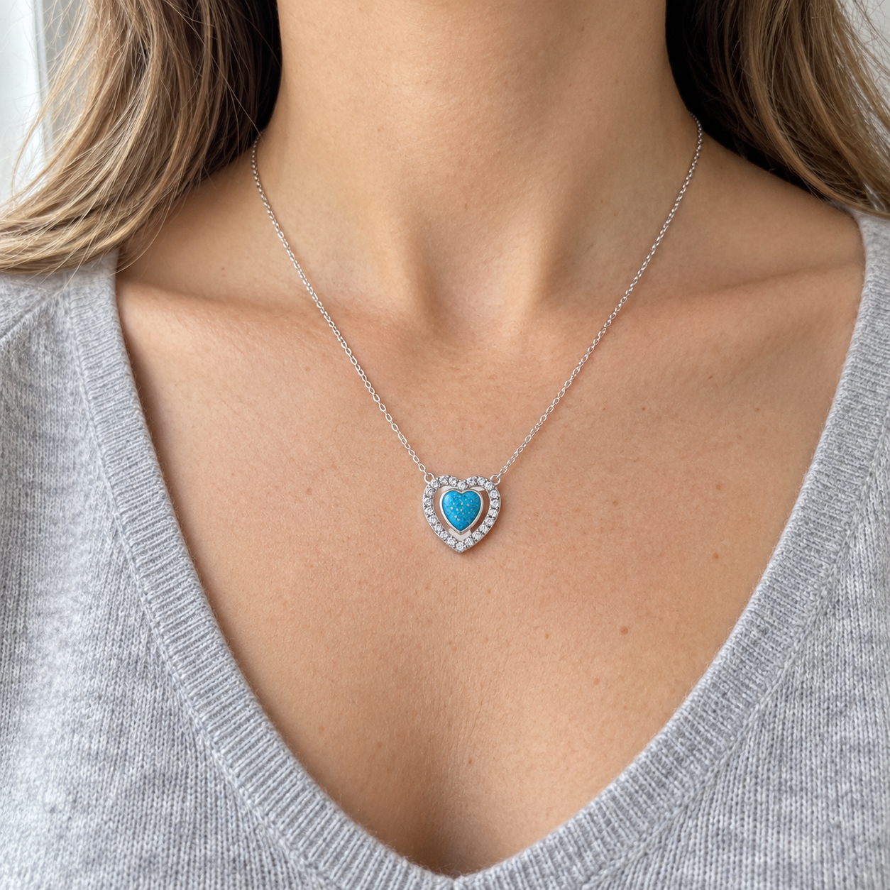 Heart Halo Ashes Necklace worn, illustrative Sky Blue finish