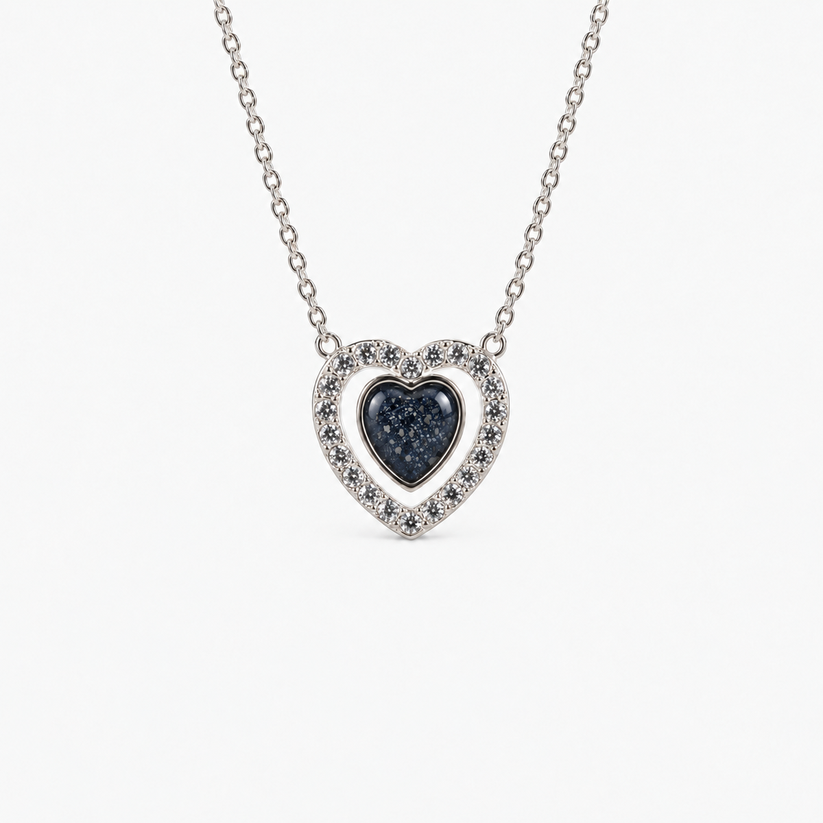 Heart Halo Ashes Necklace in Midnight with visible inclusions