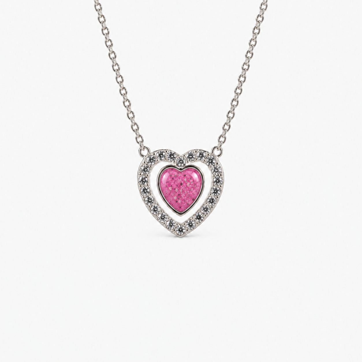 Heart Halo Ashes Necklace in Pink with visible inclusions