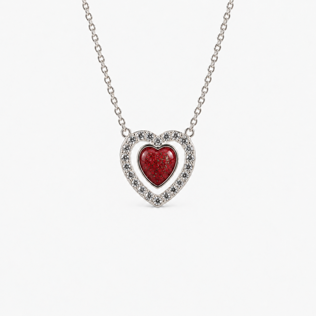 Heart Halo Ashes Necklace in Ruby Red with visible inclusions