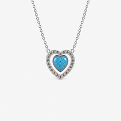 Heart Halo Ashes Necklace in Sky Blue with visible ashes