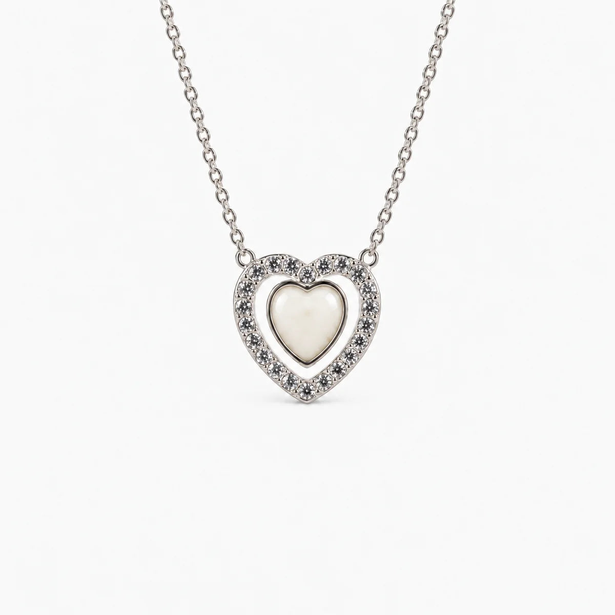 Heart Halo Breast Milk Necklace in sterling silver with natural milk resin — illustrative preview