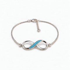 Infinity Ashes Bracelet in Sky Blue with visible inclusions — illustrative preview