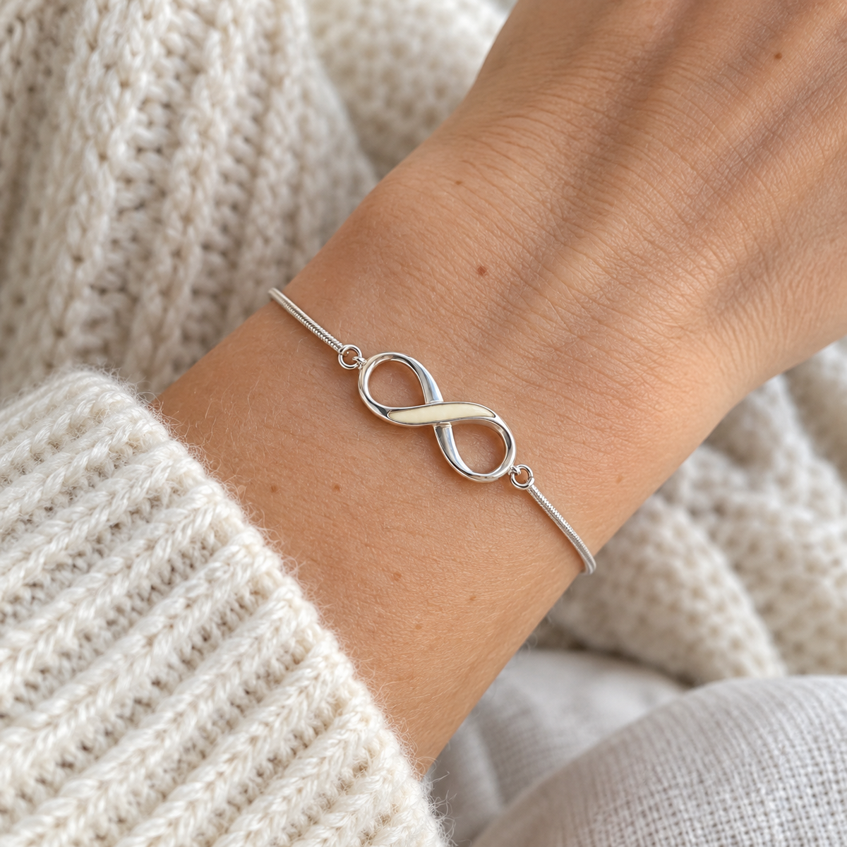 Infinity breast milk bracelet — illustrative worn preview