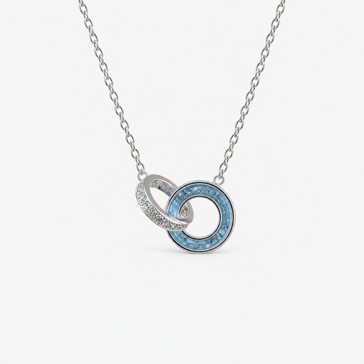 Linked Circles Ashes Necklace — Sky Blue, visible ashes