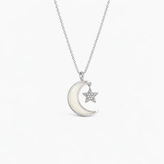 Moon and Star Breast Milk Necklace in sterling silver with natural milk resin — illustrative preview