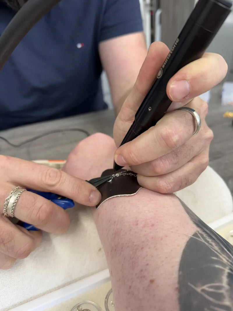 Permanent bracelet being safely welded in the Portsmouth studio