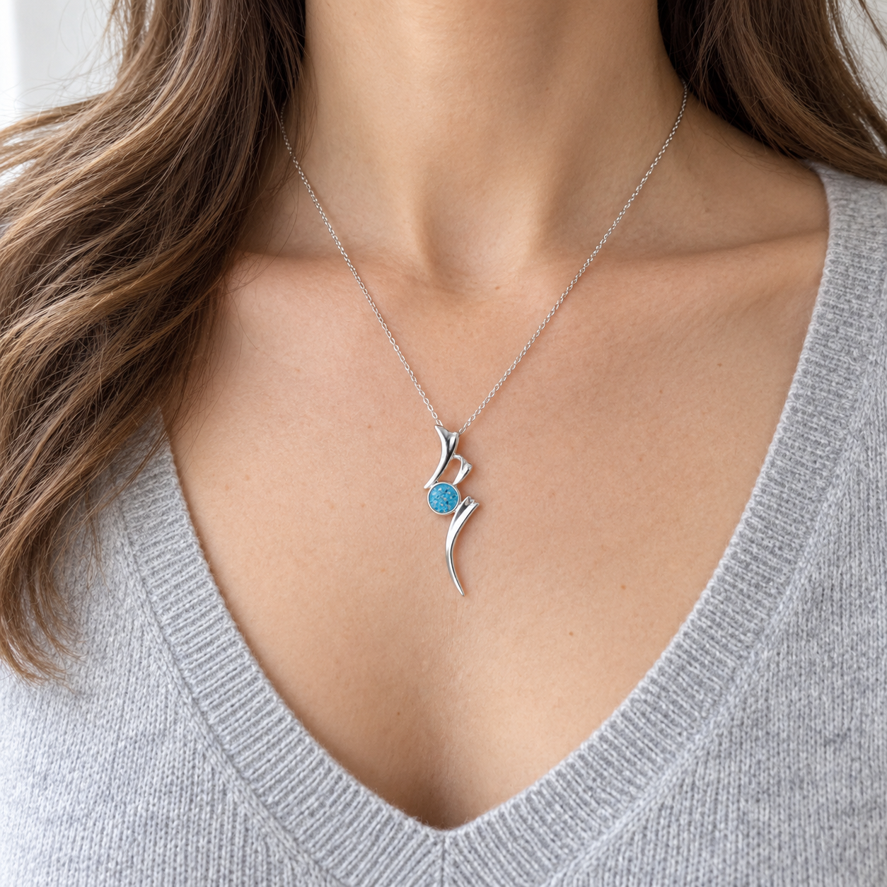 Ribbon Ashes Necklace worn, illustrative Sky Blue finish