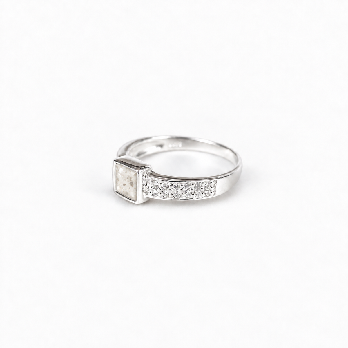 square crystal silver ashes ring in Pearl, visible inclusions