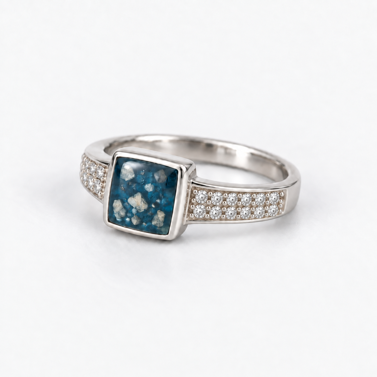 Square Crystal Ashes Ring in Sky Blue, visible ashes