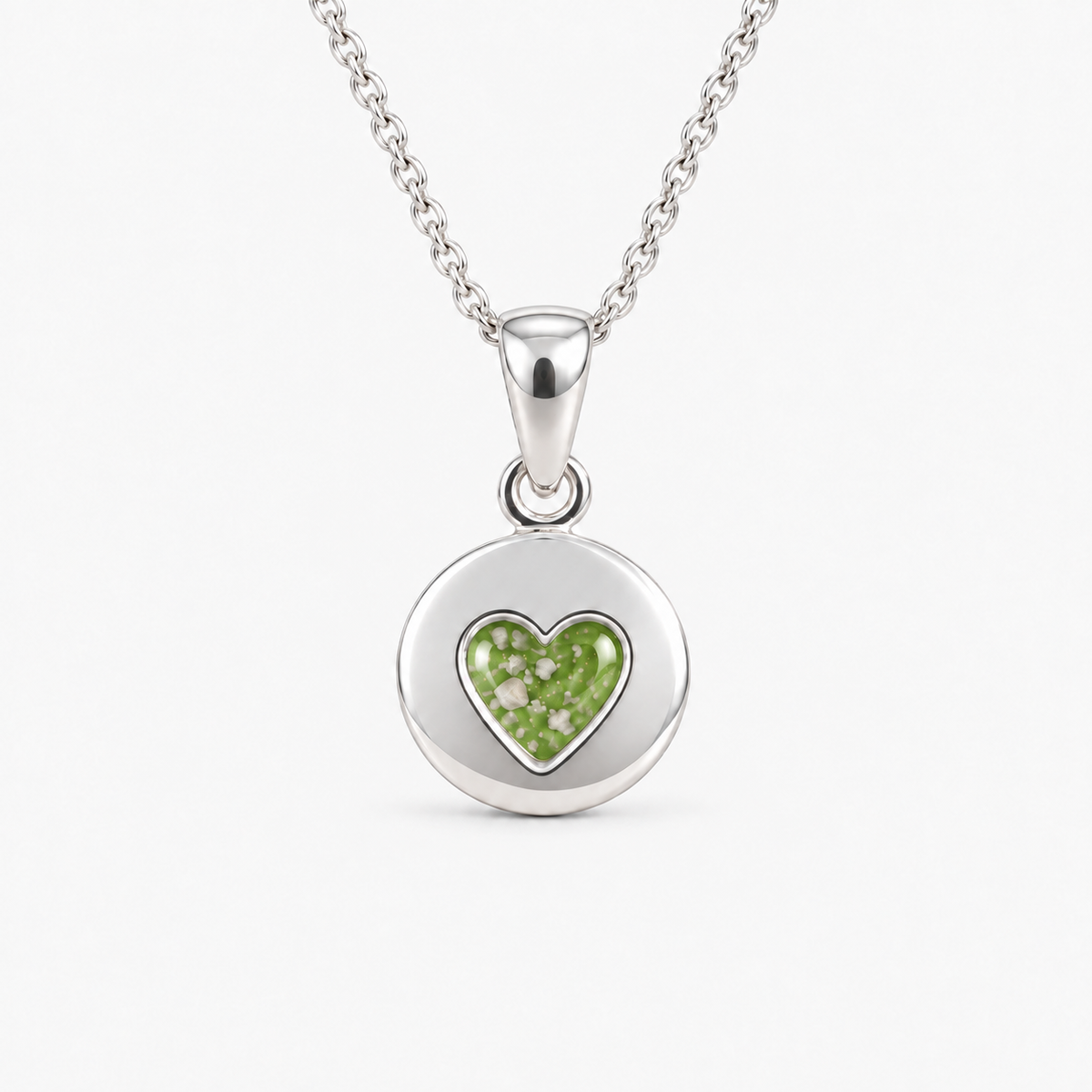 tiny heart disc ashes necklace — Apple Green, visible ashes