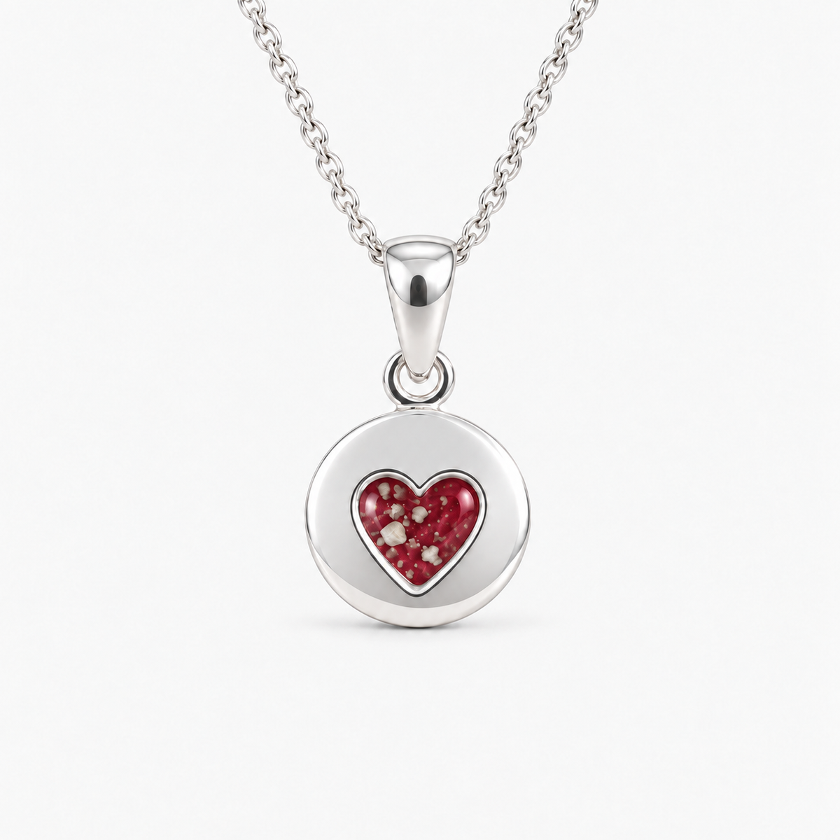 tiny heart disc ashes necklace — Ruby Red, visible ashes