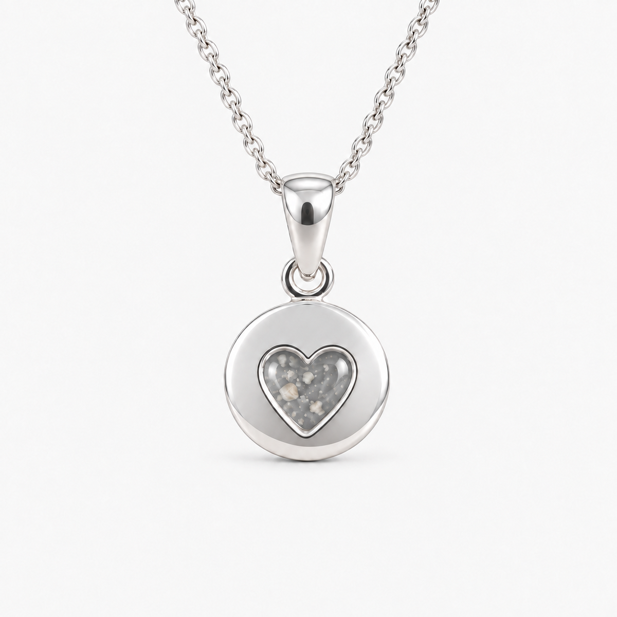 tiny heart disc ashes necklace — Silver, visible ashes