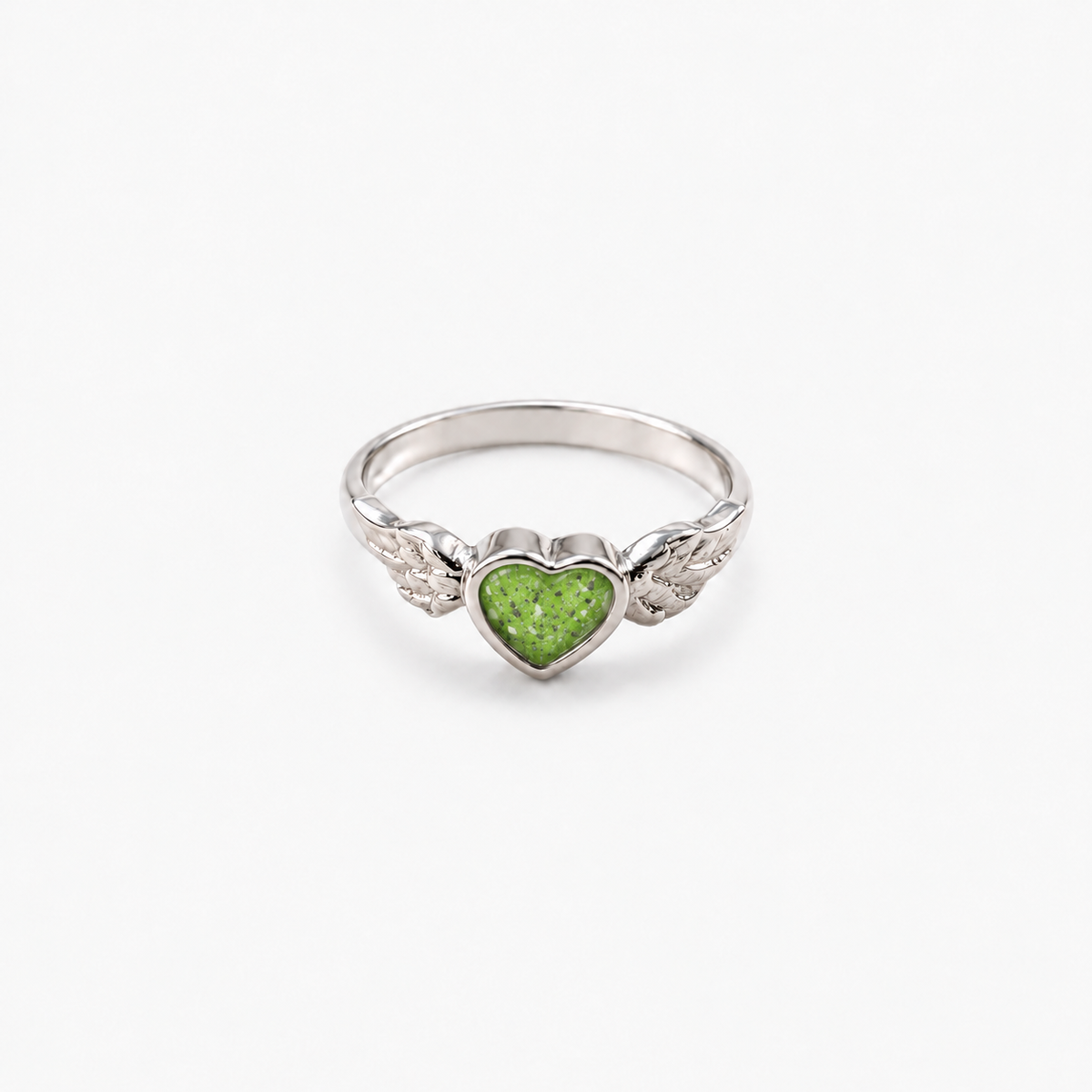 Winged Heart Ashes Ring — Apple Green, visible ashes