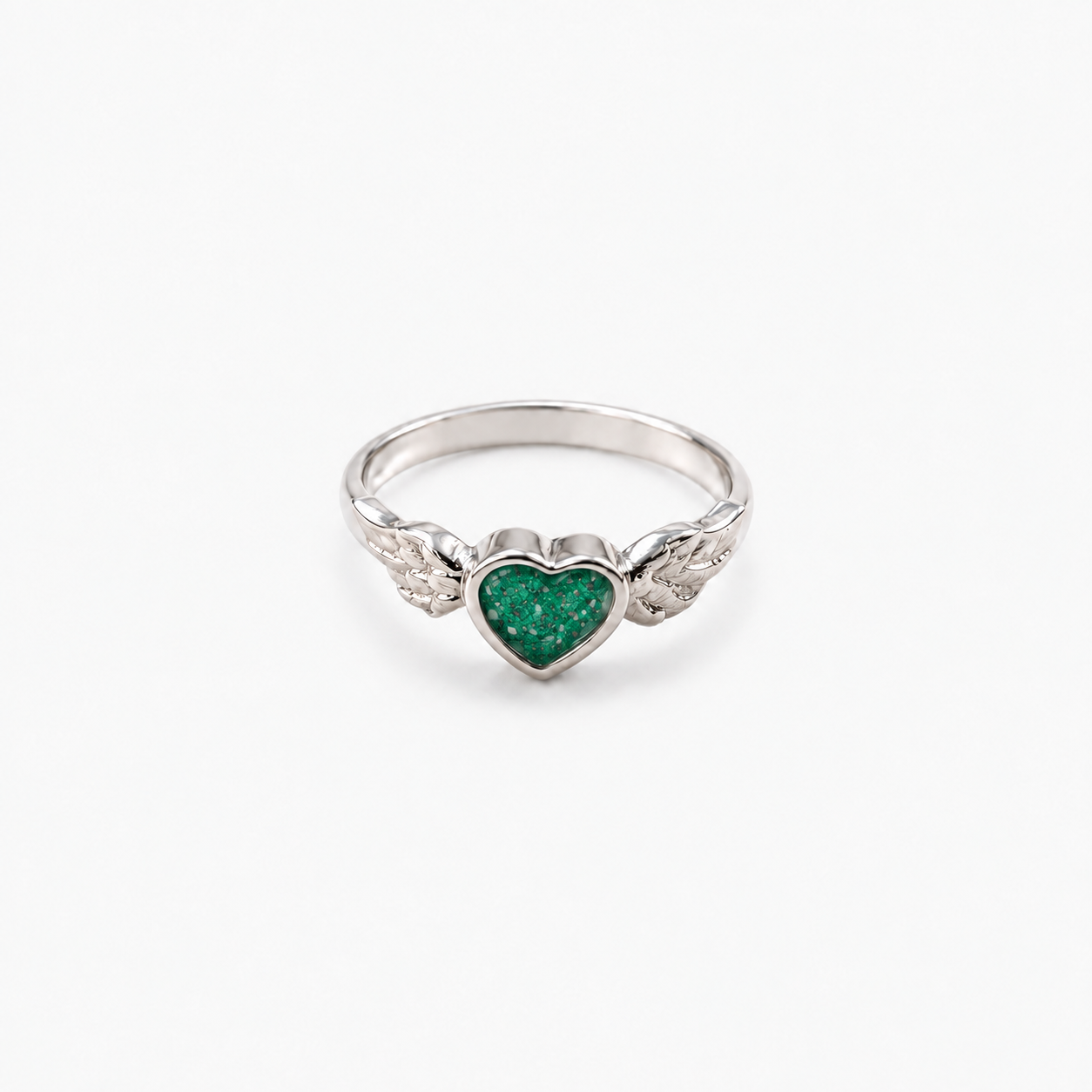 Winged Heart Ashes Ring — Emerald, visible ashes